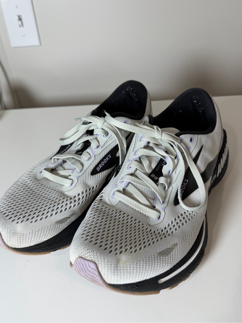 Brooks Adrenaline GTS 23 Size 10.5
White and Black Running Sneakers